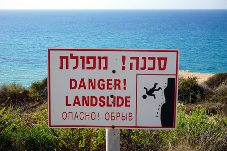 Beware of landslide sing on a Netanya sea cliff